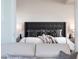 Bedroom featuring a padded headboard, accent pillows and throw blanket at 3722 Las Vegas Blvd # 2512 E, Las Vegas, NV 89158
