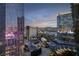 Panoramic city view of Las Vegas with surrounding buildings and mountains in the distance at 3722 Las Vegas Blvd # 2512 E, Las Vegas, NV 89158