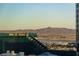 Striking city view featuring the MGM Grand Hotel, airport, and mountain range in the background at 3722 Las Vegas Blvd # 2512 E, Las Vegas, NV 89158