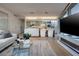 Open-concept living space with modern kitchen, comfortable seating, and expansive windows at 3722 Las Vegas Blvd # 2512 E, Las Vegas, NV 89158