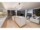 Modern condo interior featuring a sleek kitchen, dining area, and gorgeous city views at 3722 Las Vegas Blvd # 2512 E, Las Vegas, NV 89158