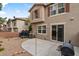 Backyard featuring a patio, small trampoline, rock landscaping, and the home's exterior at 390 Clarence House Ave # 1, North Las Vegas, NV 89032