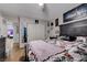 A spacious bedroom is displayed with a king-size bed and a closet at 3928 Edgemoor Way, Las Vegas, NV 89121