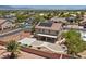 Aerial view of a home featuring solar panels, desert landscaping, a basketball court, and a spacious backyard at 4021 Mountain Trek St, Las Vegas, NV 89129