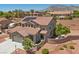 Aerial view of a beautiful two-story home with solar panels and well-manicured landscaping at 4021 Mountain Trek St, Las Vegas, NV 89129