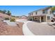 Expansive backyard features a basketball court, tiered landscaping, and a covered patio for outdoor entertaining at 4021 Mountain Trek St, Las Vegas, NV 89129