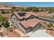 Two-story home featuring a tile roof, attached two-car garage and drought-resistant landscaping at 4021 Mountain Trek St, Las Vegas, NV 89129