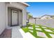 Inviting front entrance with a charming walkway, modern architectural accents, and drought-resistant landscaping at 4021 Mountain Trek St, Las Vegas, NV 89129
