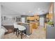 Spacious kitchen featuring a breakfast bar, modern appliances, and ample cabinet space at 4021 Mountain Trek St, Las Vegas, NV 89129