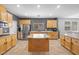 Spacious kitchen with stainless steel appliances, an island, and ample cabinet space at 4021 Mountain Trek St, Las Vegas, NV 89129