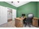 Bright office space with green walls, a carpeted floor, and sliding closet doors at 4021 Mountain Trek St, Las Vegas, NV 89129