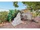 Picturesque backyard with a white statue and decorative brick pavers, creating a tranquil retreat at 4027 Maple Hill Rd, Las Vegas, NV 89115