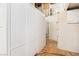 Basement space with white storage cabinets, exposed ductwork, and tiled flooring at 4027 Maple Hill Rd, Las Vegas, NV 89115