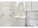 Clean bathroom featuring a walk-in shower with safety bars and a bright vanity at 4027 Maple Hill Rd, Las Vegas, NV 89115