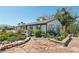 View of a single-story home with brick and stone accents and xeriscaped yard at 4027 Maple Hill Rd, Las Vegas, NV 89115