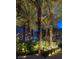 Lush landscaping and palm trees surround the well-lit entrance to The Martin at 4471 Dean Martin Dr # 2406, Las Vegas, NV 89103