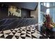 Contemporary lobby with modern artwork, elegant tile, and stylish reception desk at 4471 Dean Martin Dr # 2406, Las Vegas, NV 89103