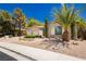 Well-maintained home with a palm tree and rock landscaping for easy maintenance at 4493 Rometta Ave, Las Vegas, NV 89141