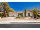 Charming single-story home with desert landscaping, three-car garage, and a bright, inviting facade at 4493 Rometta Ave, Las Vegas, NV 89141