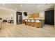 Well-designed kitchen with a large island, modern appliances, and seamless access to the dining area at 4493 Rometta Ave, Las Vegas, NV 89141