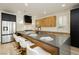 Modern kitchen features stainless steel appliances and sleek cabinetry at 4493 Rometta Ave, Las Vegas, NV 89141