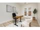 Bright office space featuring a modern desk, stylish chairs, and access to a private outdoor area through French doors at 4493 Rometta Ave, Las Vegas, NV 89141