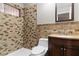 Bathroom showcasing stylish vanity and tiled shower with mosaic accents at 4775 Woodridge Rd, Las Vegas, NV 89121