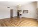 Expansive living room boasts wood floors, ceiling fan, and an open layout at 4775 Woodridge Rd, Las Vegas, NV 89121