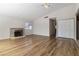 Bright living room with hardwood floors, high ceilings, fireplace and ample natural light at 4775 Woodridge Rd, Las Vegas, NV 89121