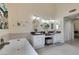 Bright bathroom with double sinks, granite countertops, soaking tub, and lots of vanity storage at 5133 Southern Hills Ln, Las Vegas, NV 89113