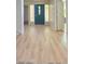 Inviting entryway featuring durable floors, a striking front door, and abundant natural light at 5133 Southern Hills Ln, Las Vegas, NV 89113