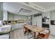 A chef's kitchen with stainless steel appliances, custom cabinetry, and an island great for gathering at 5133 Southern Hills Ln, Las Vegas, NV 89113