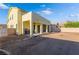 Large backyard features a covered patio and is ready for landscaping at 5907 Soft Mist Ct, Las Vegas, NV 89110