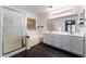 Bathroom with a shower, bathtub, dual sinks, and wood-look floors at 5907 Soft Mist Ct, Las Vegas, NV 89110