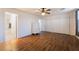 Bedroom with vinyl floors and access to the bathroom at 5907 Soft Mist Ct, Las Vegas, NV 89110
