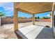 Covered patio and backyard awaiting personalization at 5938 Village Loft St, North Las Vegas, NV 89081