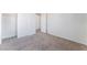 Spacious bedroom boasts neutral carpet and closet at 5938 Village Loft St, North Las Vegas, NV 89081