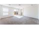 Spacious bedroom with sliding glass door leading to balcony at 5938 Village Loft St, North Las Vegas, NV 89081