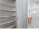 Storage closet with shelving near bathroom at 5938 Village Loft St, North Las Vegas, NV 89081