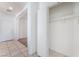 Walk-in closet with an open door and white walls at 5938 Village Loft St, North Las Vegas, NV 89081