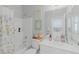 Bright bathroom featuring shower/tub combo with white vanity at 6429 Joshuaville Dr, Las Vegas, NV 89122