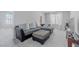 Cozy upper living area featuring plush seating, soft carpet, and natural light at 6429 Joshuaville Dr, Las Vegas, NV 89122