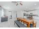 Bright open-concept living area features a kitchen, dining area and sitting area at 6429 Joshuaville Dr, Las Vegas, NV 89122
