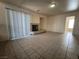 The living room features tile floors, a fireplace, and a bright, airy atmosphere at 6608 Buried Treasure Ct, Las Vegas, NV 89139