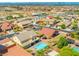 Neighborhood aerial view showcasing diverse architectural styles and a vibrant community at 6958 Lazy Sunset Ct, Las Vegas, NV 89156