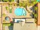 Expansive property aerial view revealing lush landscaping, pool, spa, and elegant outdoor living spaces at 6958 Lazy Sunset Ct, Las Vegas, NV 89156