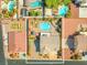 Property aerial view highlighting backyard oasis with pool, spa, and lush landscaping at 6958 Lazy Sunset Ct, Las Vegas, NV 89156