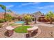 Beautiful backyard with a pool, lush landscaping, gazebo, and patio at 6958 Lazy Sunset Ct, Las Vegas, NV 89156