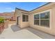 Balcony featuring stucco walls and sliding glass door with views of mountains at 6958 Lazy Sunset Ct, Las Vegas, NV 89156