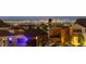This property offers stunning panoramic city views that stretches for miles in the distance at 6958 Lazy Sunset Ct, Las Vegas, NV 89156